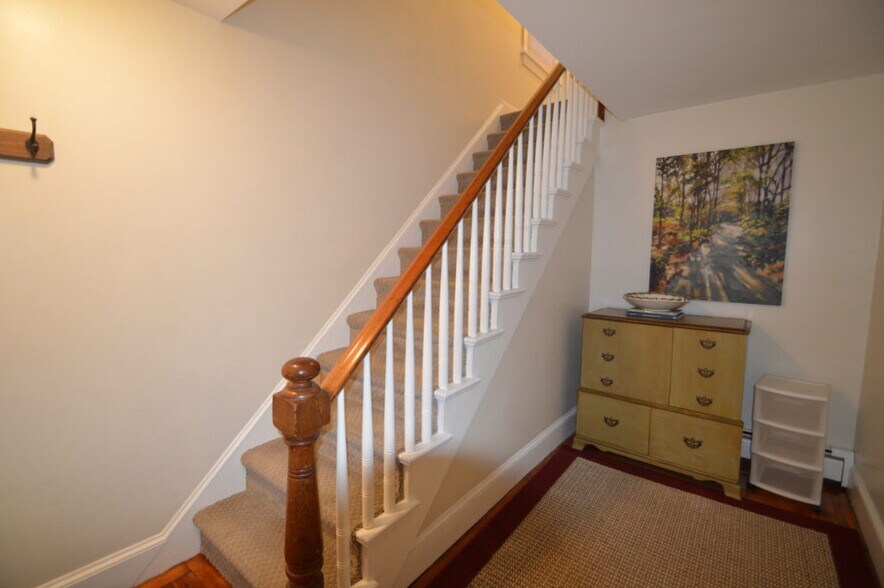 Safe and bright shared front hallway - 468 Spring St