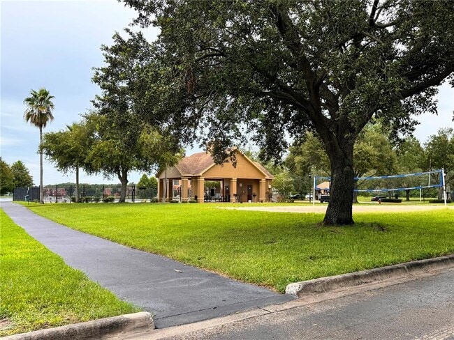 Building Photo - 9842 Lake Chase Island Way