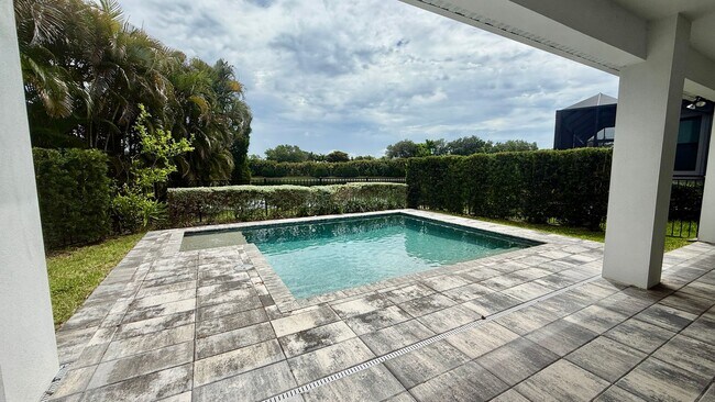 Building Photo - Rare Lakefront Pool Home in Exclusive Gated Sandhill Lake – Resort-Style Living Awaits