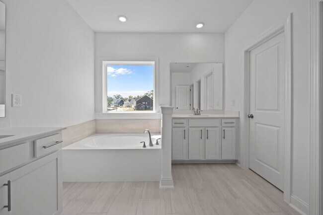 Building Photo - Brand-New 5BR/4BA in Knightdale’s Stoneriver – Luxury Living with 3-Car Garage