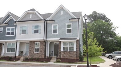 Building Photo - Brand New, End Unit Townhome Close to Down...