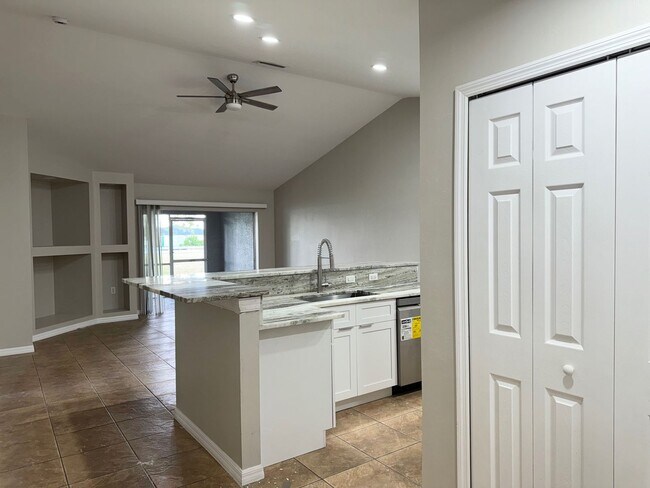 Building Photo - Experience this Cape Coral 3 bedroom 2 bath corner duplex with 1 car garage and screened in lanai.