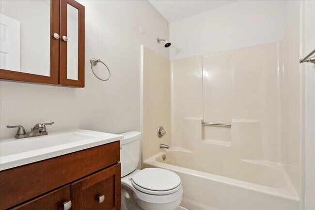 The primary bedroom offers a private, ensuite bathroom - 1644 Skiffes Creek Cir