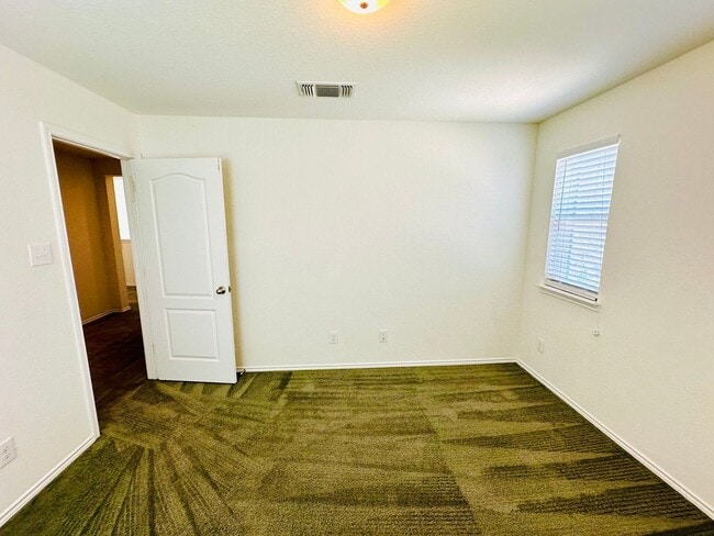 Building Photo - Your Dream Awaits! A Charming 4 bedroom 2....