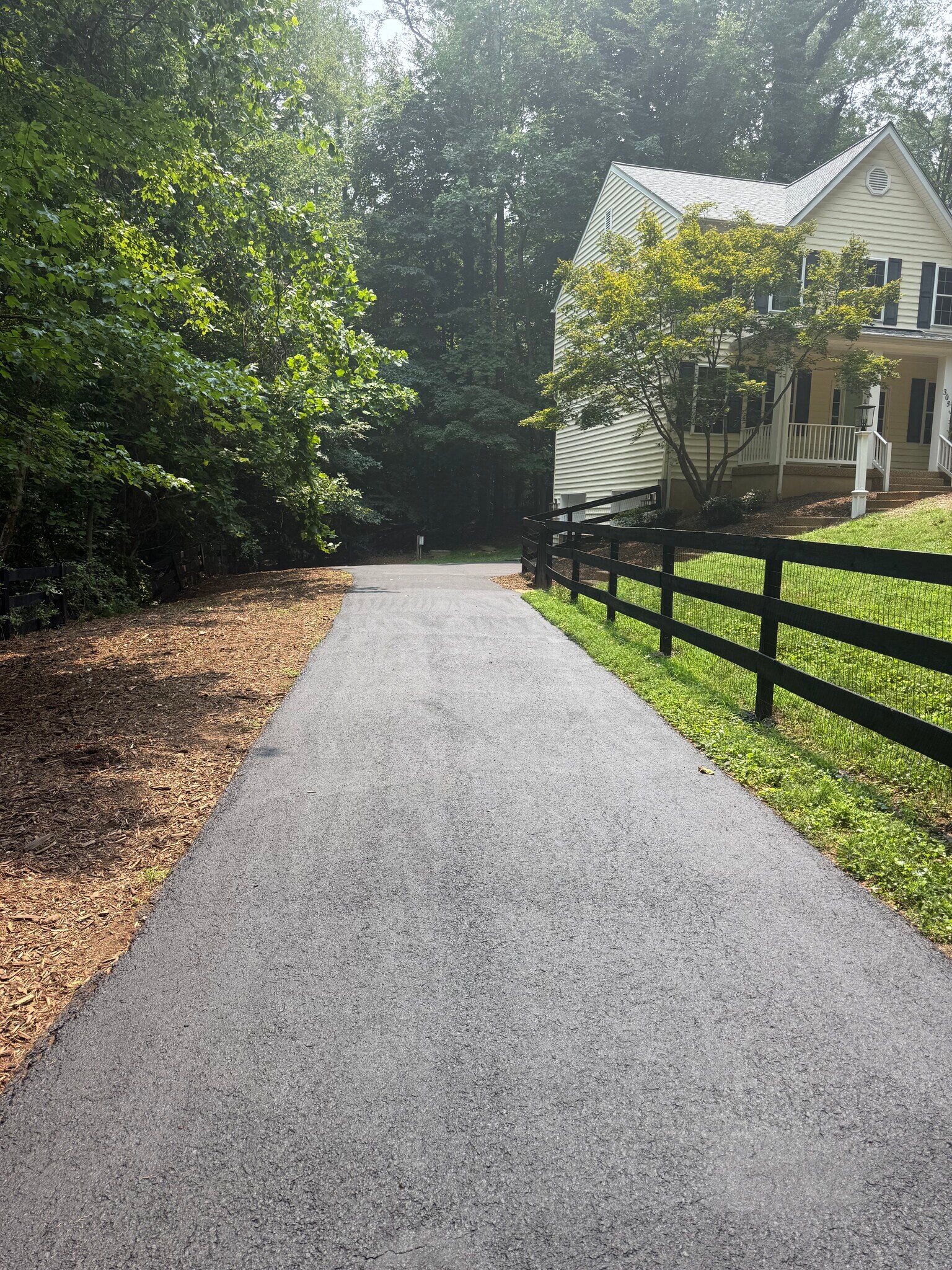 drive and fencing resealed - 305 E Monacan Dr