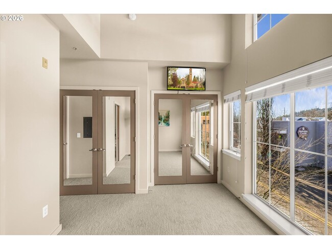 Building Photo - Main Street Living with Granite Kitchen, Gas Fireplace, and MAX Line Access