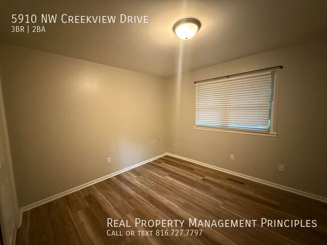 Building Photo - 5910 NW Creekview Drive-