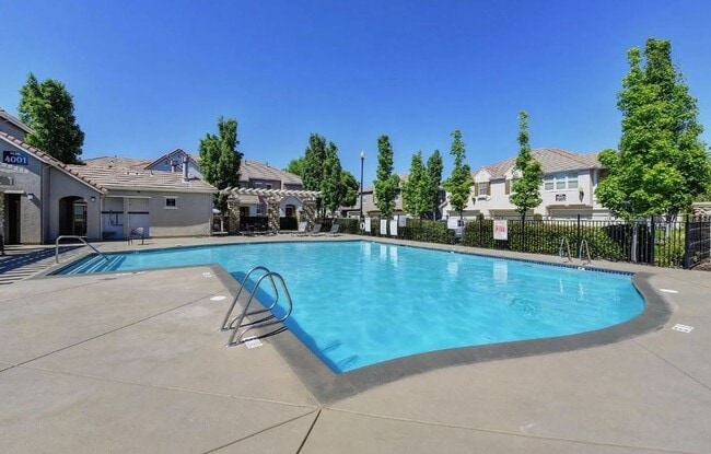 Building Photo - Experience Esplanade! Premier Townhome Com...