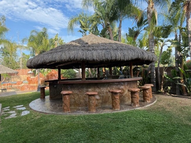 Building Photo - Gated estate with a backyard oasis