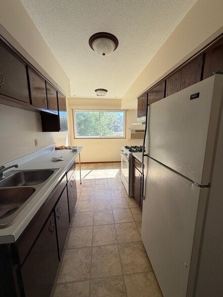 Building Photo - 4819 Azelia Ave N