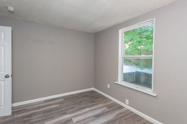 Building Photo - 8819 North Ave