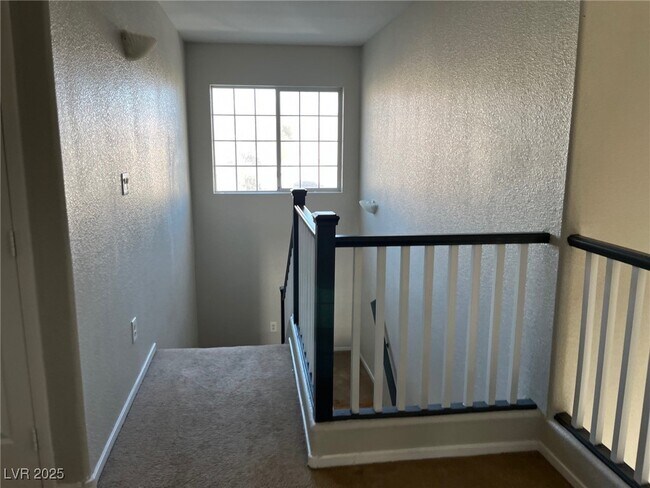 Building Photo - 8037 Peaceful Village Pl