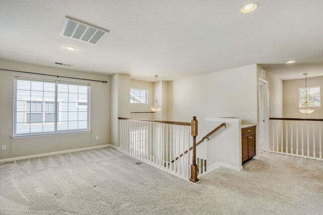 Building Photo - Bright, Seamless Living in Longmont’s Premier School District