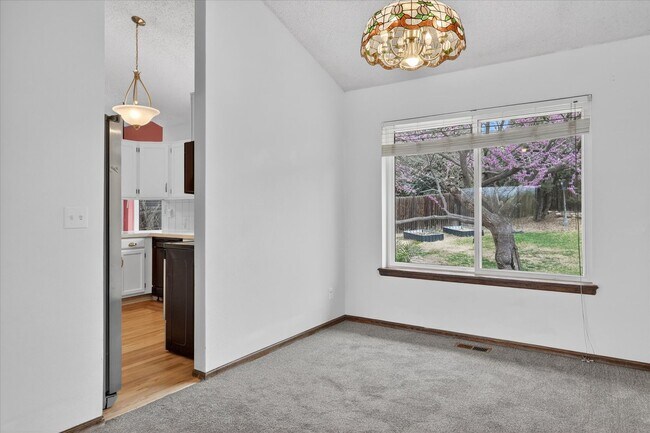 Building Photo - 4BR/4BA Updated Home with Finished Basement Suite & Landscaped Yard