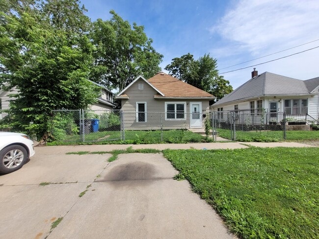 Building Photo - Two bedroom home with partially fenced yard!