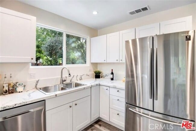 Building Photo - 17902 Saticoy St