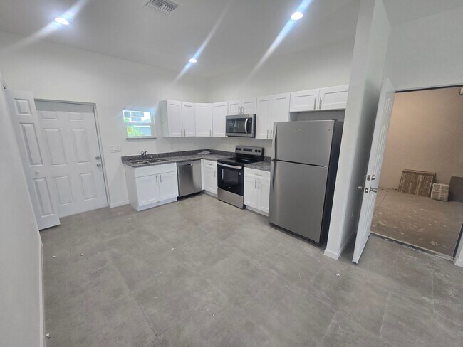 Building Photo - BRAND NEW 2/2/1 -LEHIGH ACRES