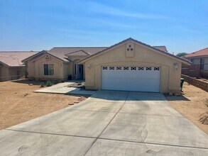 Building Photo - 4 bedroom and ll appliances included!