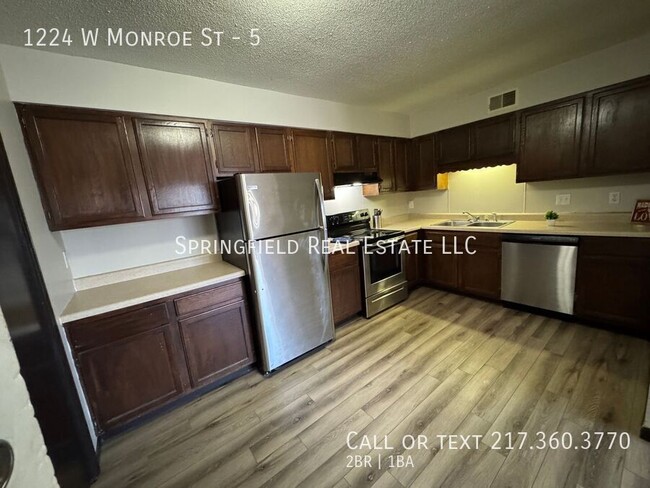 Building Photo - Sparkling 2 Bed 1 Bath Gem with Modern Upg...