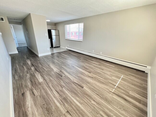 Explore this bright and open living area, perfect for modern living and entertaining. - Wadsworth Station West