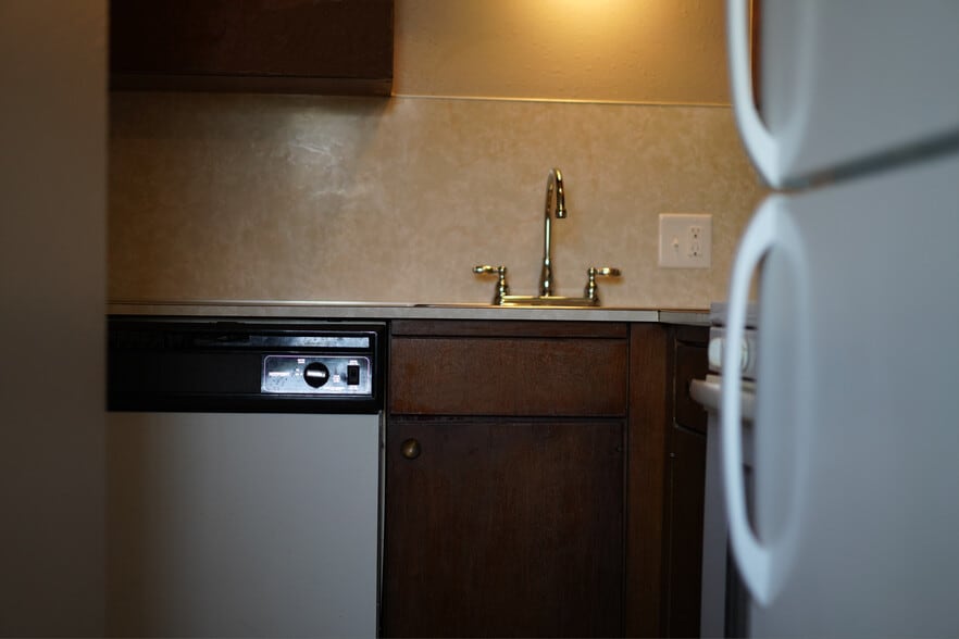 kitchen sink - 9909 E 12th St