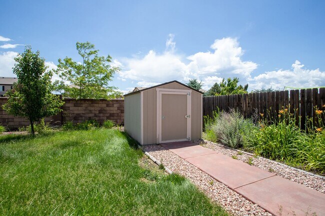 Building Photo - Spacious 5-Bedroom Home with Finished Base...