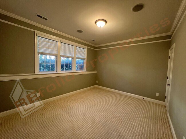 Building Photo - Elegant 3 Story 3 Bedroom Formal Model Tow...