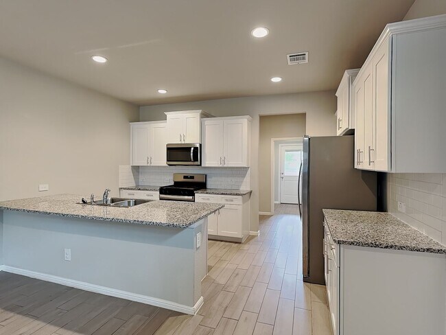 Building Photo - Charming Dollhouse Living with Designer Finishes & a Private Backyard Retreat!