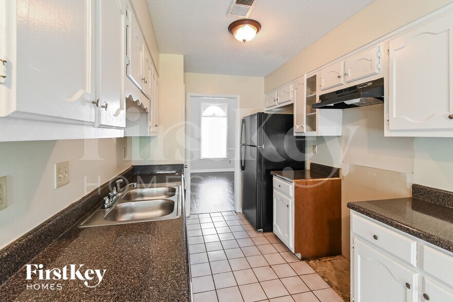 Building Photo - 8441 Woolrich Dr