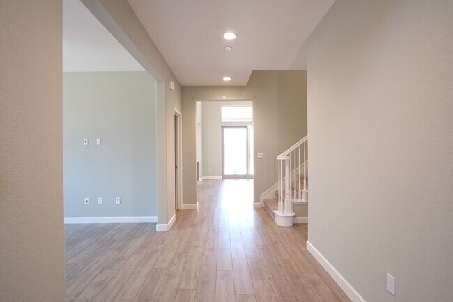 Building Photo - Available now! Beautiful Newer Home in Man...