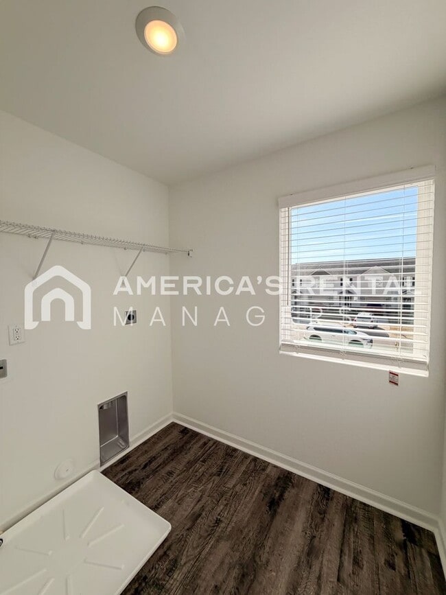 Building Photo - Spacious Two-Story Townhome with Open Layout!