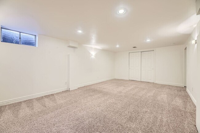Building Photo - Spacious Home w/Large Backyard Only Blocks...
