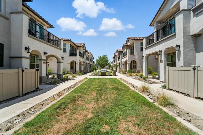 Building Photo - 2022-Built Eastmark Gem with Resort-Style ...