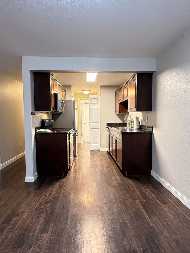 Building Photo - Ground-Level 2-Bedroom Condo at Martha’s Landing – Prime Mill Creek Location