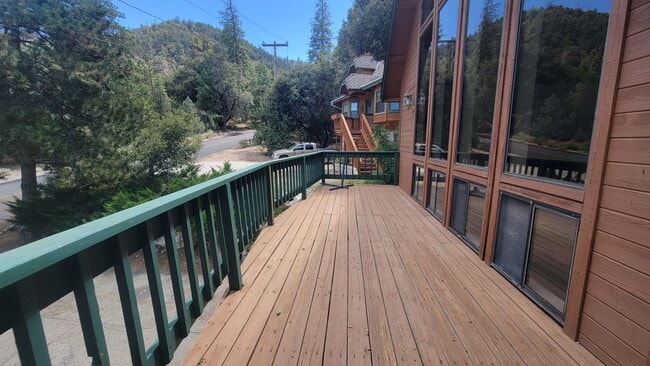 Building Photo - Spacious Mountain Retreat with Garage, Deck & Trail Access