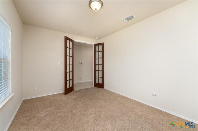 Building Photo - 5900 Amelia Earhart Blvd