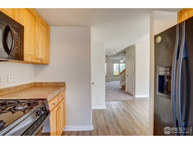 Building Photo - Bright & Beautiful 2-Level Condo in NoBo, available June 5th