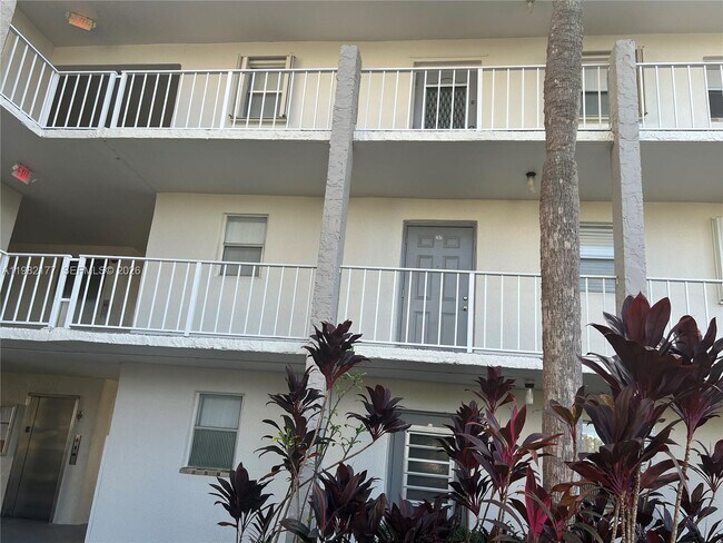 Building Photo - 8595 Sunrise Lakes Blvd