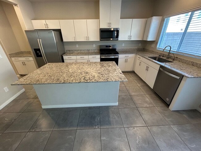 Building Photo - Gorgeous two-story home with 5 bedrooms and 3 bathrooms in a gated community