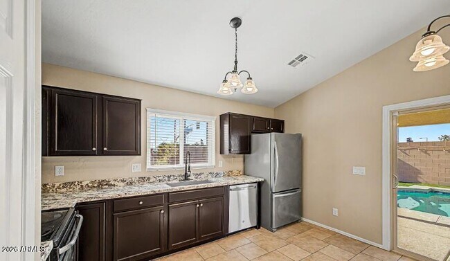 Building Photo - 23765 W Desert Bloom St
