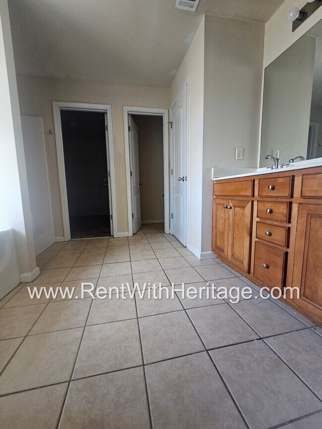 Building Photo - WOW!!...GORGEOUS!!..UPGRADES /AMAZING MASTER/ FENCED YD/ SWIM-TENNIS