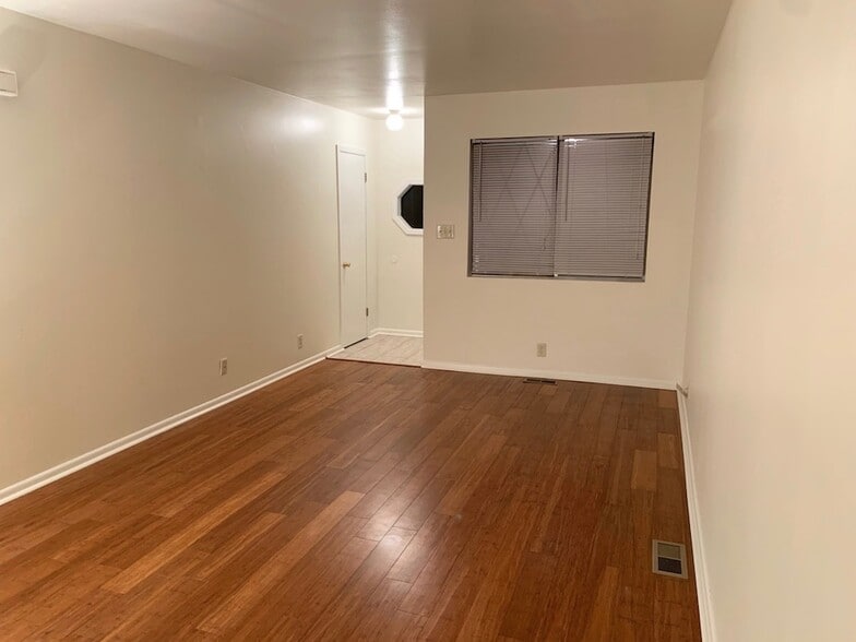 Tiled entryway opens into living room - 4209 Northwest 57th Terrace