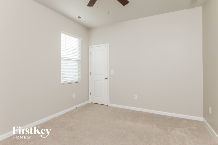 Building Photo - 304 Whispering Wind Way