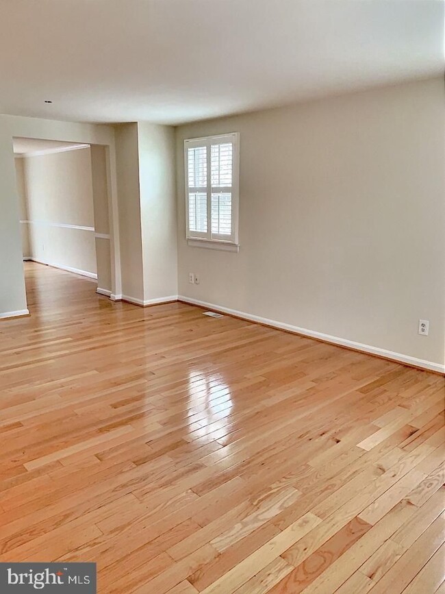 Building Photo - Welcome to this beautifully maintained brick end residence in the heart of Falls Church, where co...