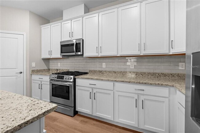 Building Photo - 15719 Islandwalk Ave