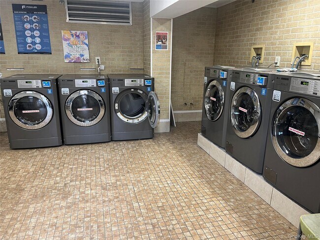 Building Photo - 208-08-208-39 39th Ave