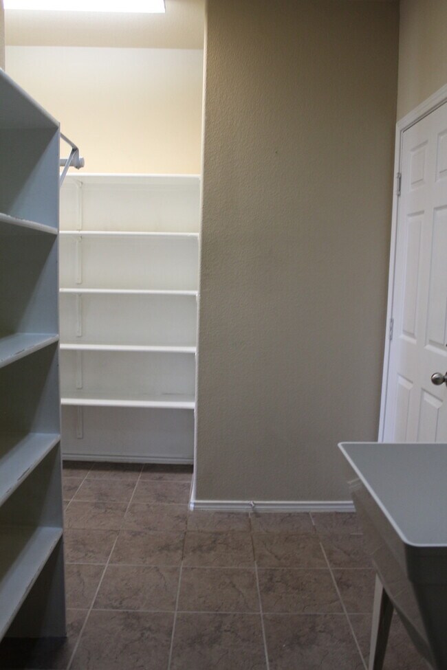 Building Photo - Over 3000 square feet with 3 car garage!