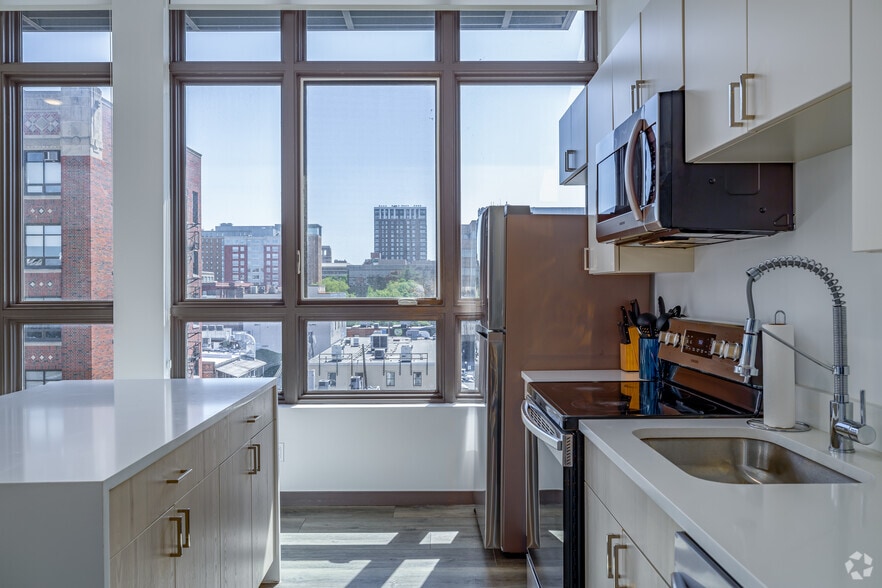 1BR, 1BA - 559SF - Kitchen - Exhibit A2 Furnished Luxury Apartments