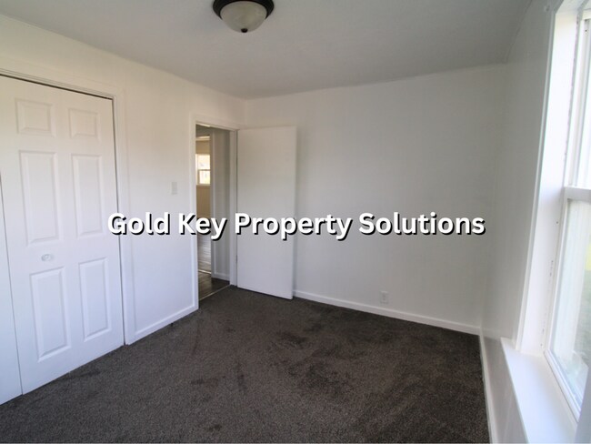 Building Photo - 2 BR 2 BA House with 2-Car Garage and Cent...