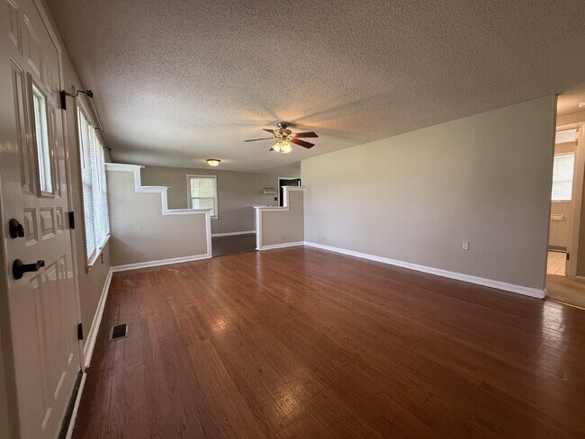 Building Photo - "Charming 4-Bedroom Home with Hardwood Floors on Ready Section Road!"